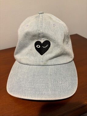 PacSun Light Blue Denim Ball Cap with winking heart embroidery